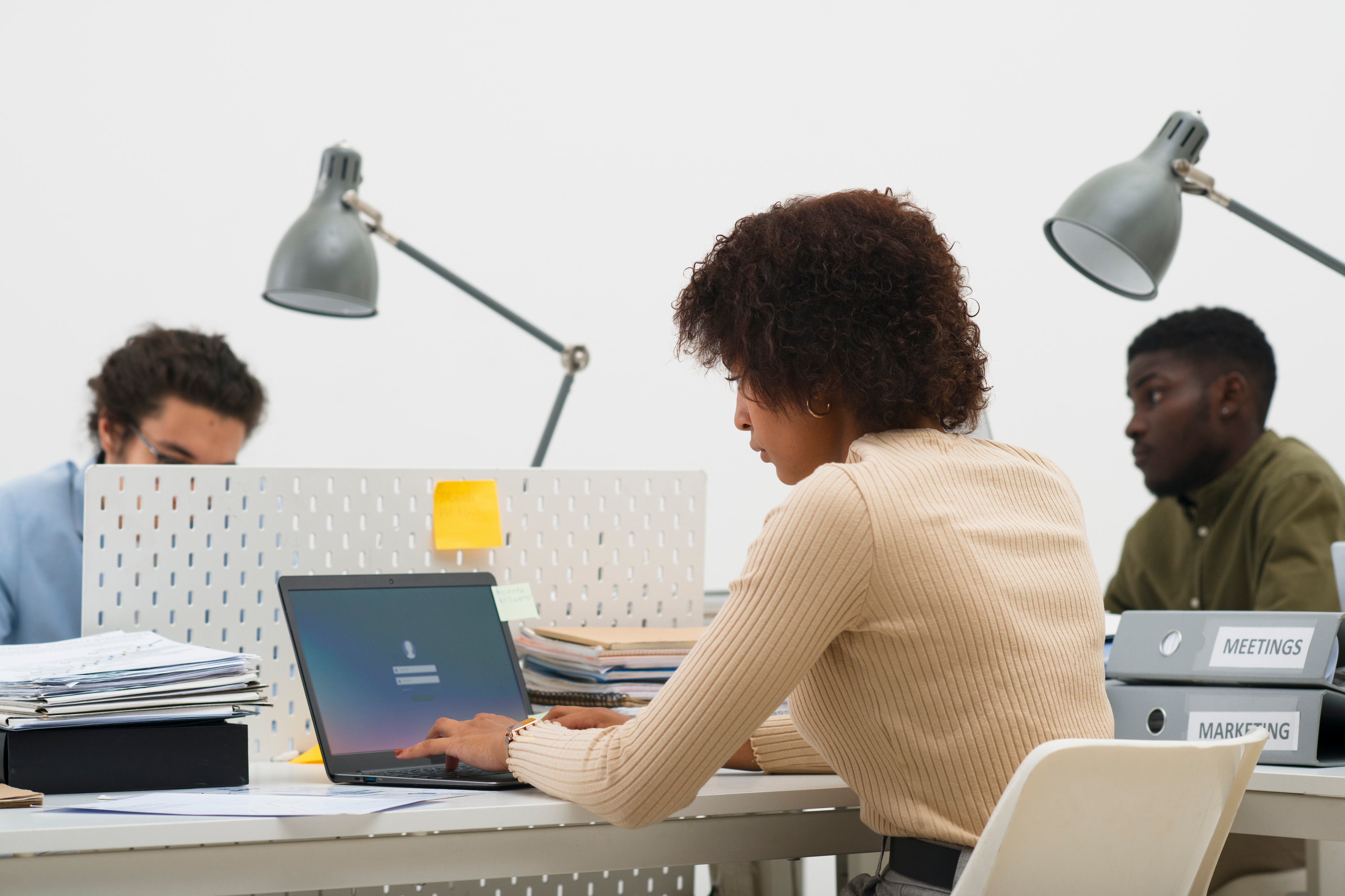 A team working together at an office desk